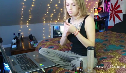 Petite teen Arwen inserting a black dildo in her tight snatch