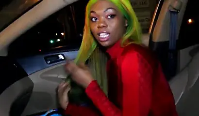 Green-haired ebony prostitute fucked in the car