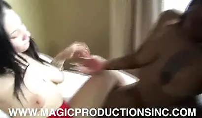 Ebony lesbian Redbone eating her tattooed girlfriend's pussy