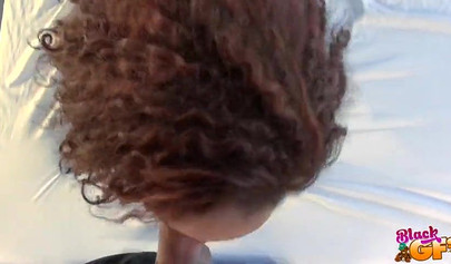 Exotic babe Kendall Woods feeds herself with a white meat pole