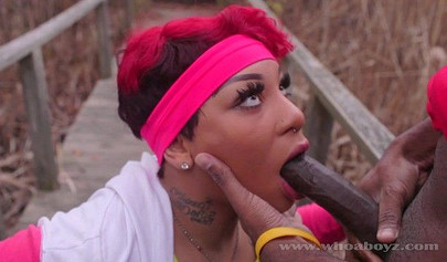 Curvy ebony Cali Kush gives outdoor head and fucks a BBC