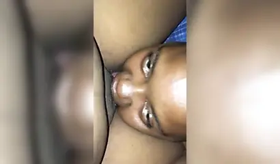 Ebony sugar babe licking a black clitoris up close