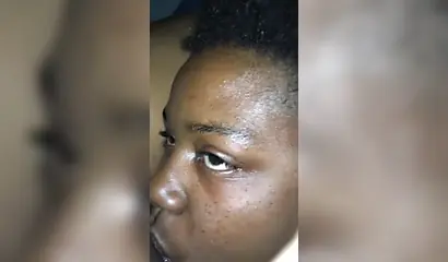 Ebony sugar babe licking a black clitoris up close