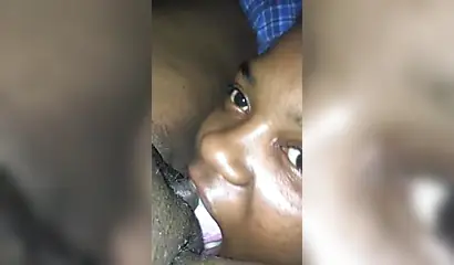 Ebony sugar babe licking a black clitoris up close