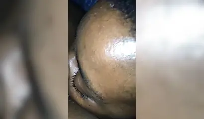 Ebony sugar babe licking a black clitoris up close