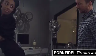 Busty ebony in fishnet pantyhose Brittney White gets her twat creampied