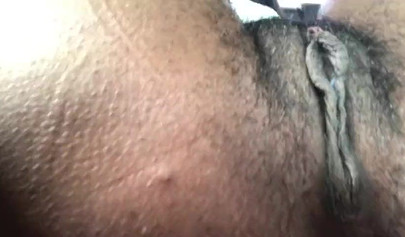 African nympho fingering and toying her bushy twat