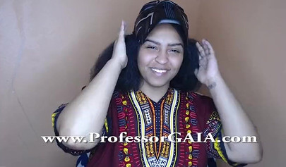 Exotic ebony lifts her dress up & shows her big tits & hairy pussy