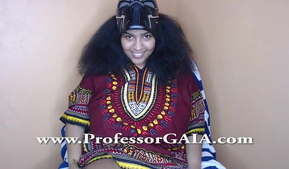 Exotic ebony lifts her dress up & shows her big tits & hairy pussy