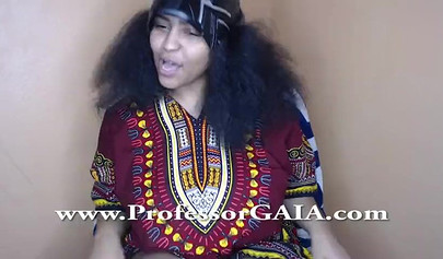 Exotic ebony lifts her dress up & shows her big tits & hairy pussy