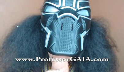 Exotic ebony lifts her dress up & shows her big tits & hairy pussy