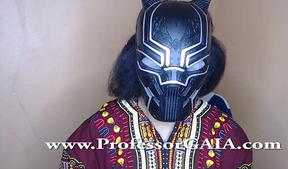 Exotic ebony lifts her dress up & shows her big tits & hairy pussy