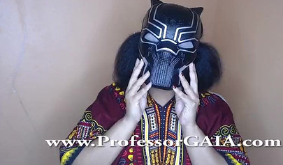 Exotic ebony lifts her dress up & shows her big tits & hairy pussy