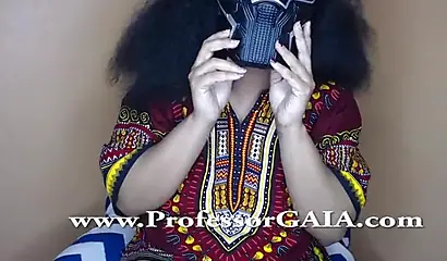 Exotic ebony lifts her dress up & shows her big tits & hairy pussy