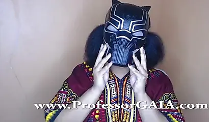 Exotic ebony lifts her dress up & shows her big tits & hairy pussy