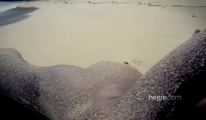 Big boobed Caribbean stunner posing and swimming naked