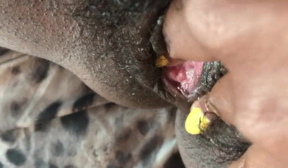 Black slut cums while masturbating up close