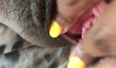 Black slut cums while masturbating up close