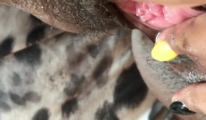 Black slut cums while masturbating up close