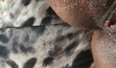 Black slut cums while masturbating up close