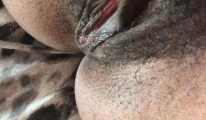 Black slut cums while masturbating up close