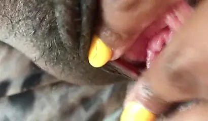 Black slut cums while masturbating up close