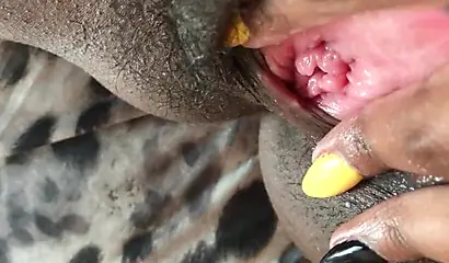 Black slut cums while masturbating up close