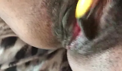 Black slut cums while masturbating up close