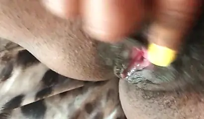 Black slut cums while masturbating up close