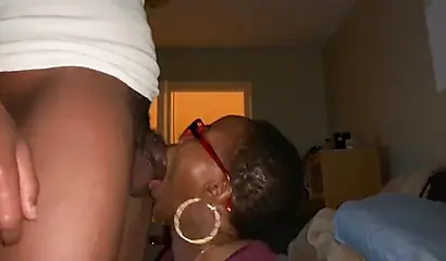 Geeky ebony deepthroats a monster black dick