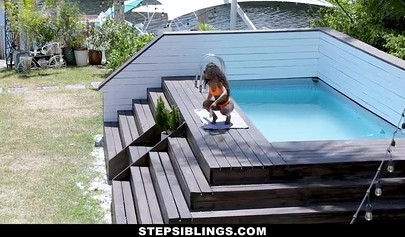 Ebony bikini babe Demi Sutra rides her hairy snatch on a hard dick