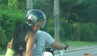 Attractive black babe gets her bubble booty oiled up before fucking