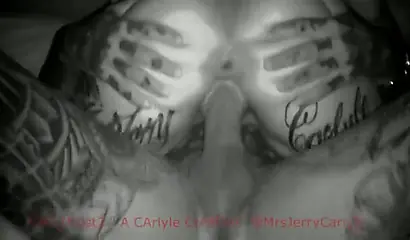 Tattooed ebony couple screwing in the dark