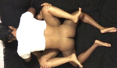 Black couple enjoying intense missionary sex