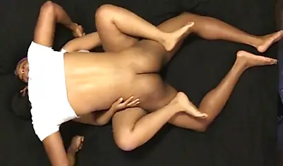 Black couple enjoying intense missionary sex