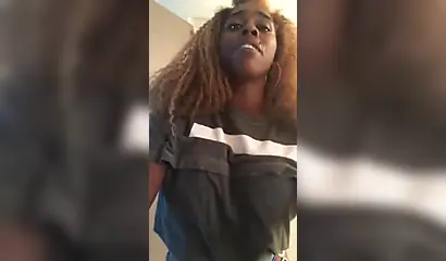 Playful ebony lifts her shirt up and shows her tits on IG