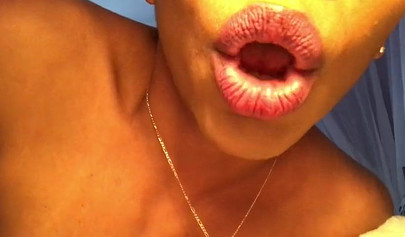 Hottie plays with her black snatch until she cums hard