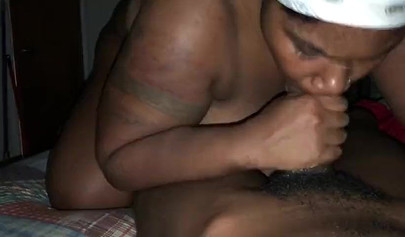 Huge ebony wife takes a cumload in her mouth while sucking a BBC