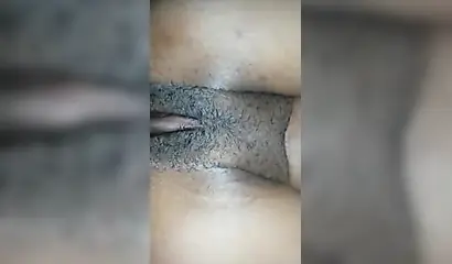 Purple-haired ebony squirts as she gets fucked