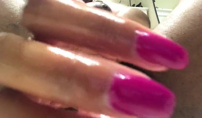 Sexy black babe rides her snatch on a white toy