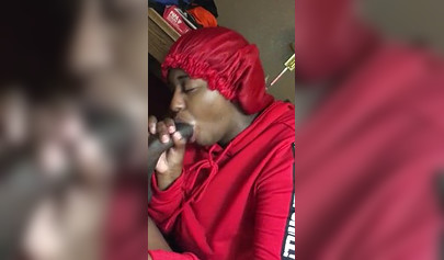 Black nympho with a nose ring sucking a huge ebony dick