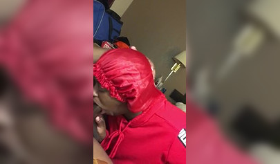 Black nympho with a nose ring sucking a huge ebony dick