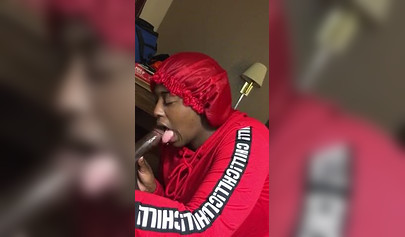 Black nympho with a nose ring sucking a huge ebony dick