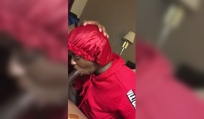 Black nympho with a nose ring sucking a huge ebony dick