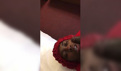 Black nympho with a nose ring sucking a huge ebony dick