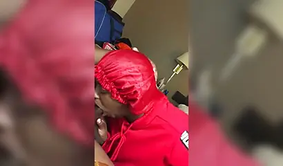 Black nympho with a nose ring sucking a huge ebony dick