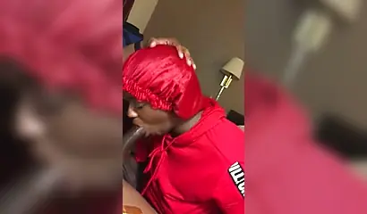 Black nympho with a nose ring sucking a huge ebony dick