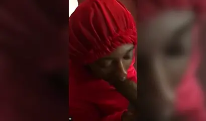 Black nympho with a nose ring sucking a huge ebony dick