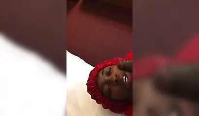 Black nympho with a nose ring sucking a huge ebony dick