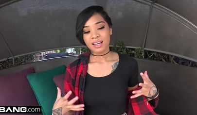 Inked ebony Honey Gold masturbates & fucks a throbbing dick